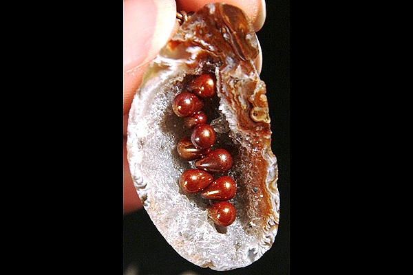 Drops of Copper Inside Agate Crystal Cave